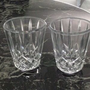 Two heavy Crystal Glasses pretty design on them.